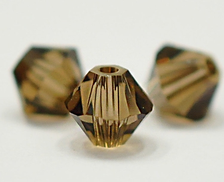 Swarovski 4 mm bicone rök, 1 st