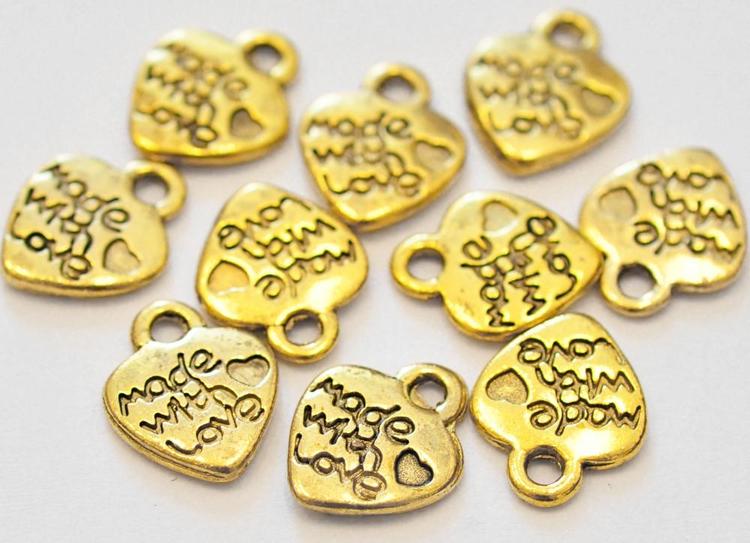 Antikt guldfärgade berlocker hjärtan Made with love, ca 100 st