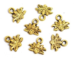 Antikt guldfärgade berlocker små lotusblommor, 10 st