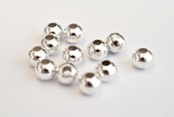 Silverfärgade metallpärlor 2-3 mm, ca 50 st