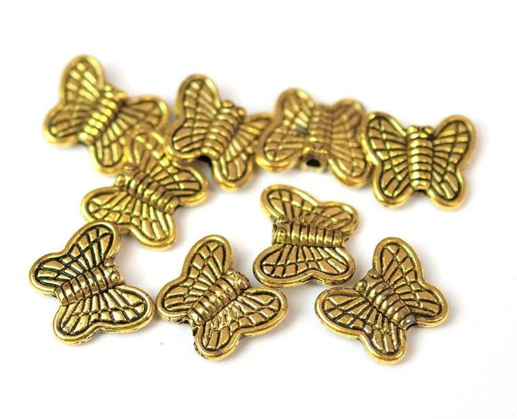 Antikt guldfärgade mellandelar fjärilar, 10 st