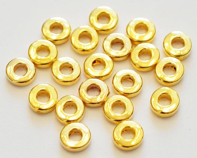 Guldfärgade mellandelar raka och runda 6 mm, ca 50 st