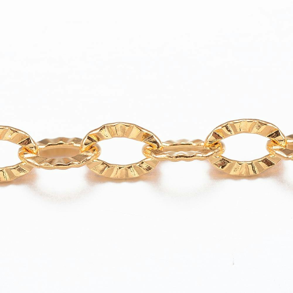 Guldfärgat rostfritt stål kedja 3.5x2.5 mm med PVD plätering, 1 m