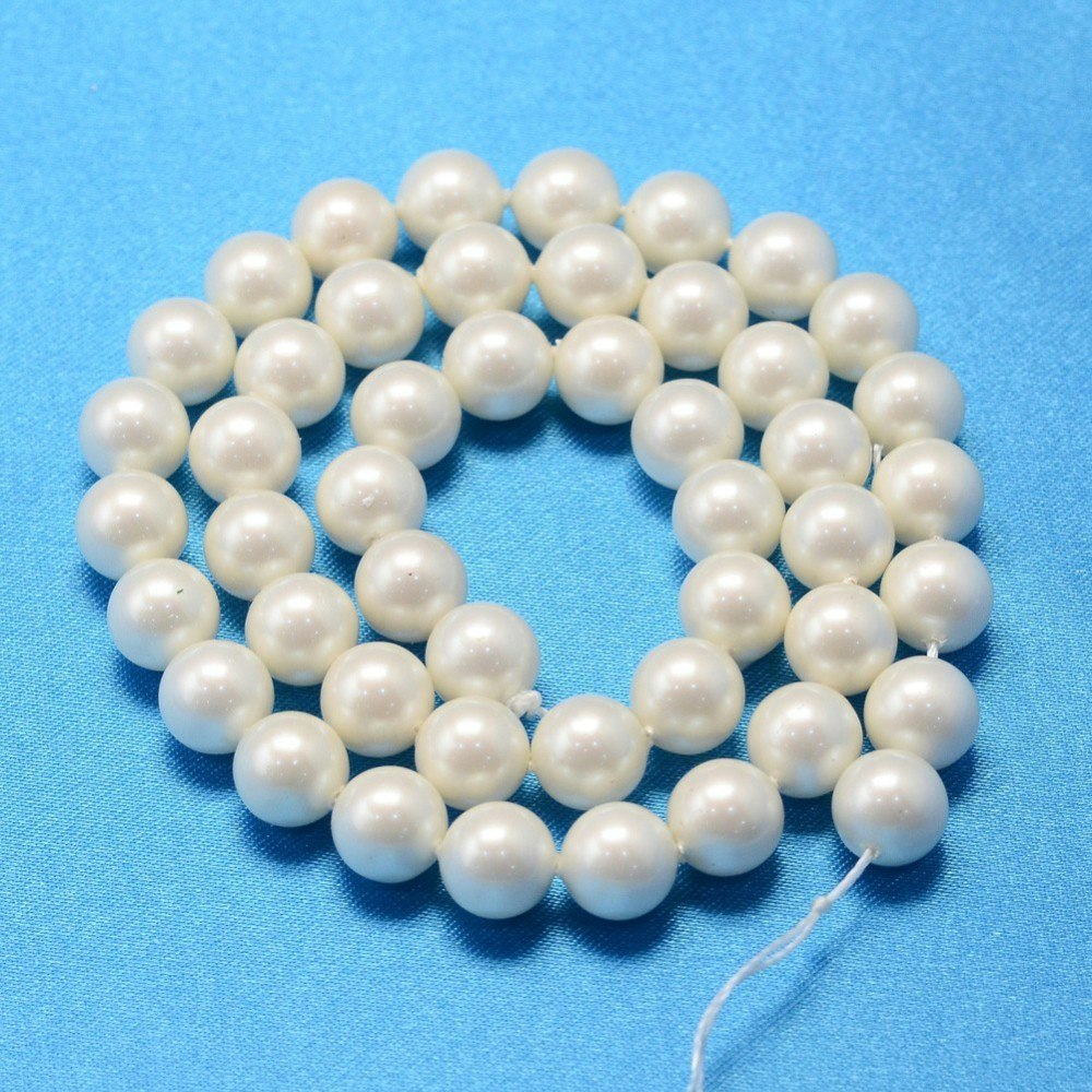 Snäckskalspärlor creme 8 mm, 1 sträng