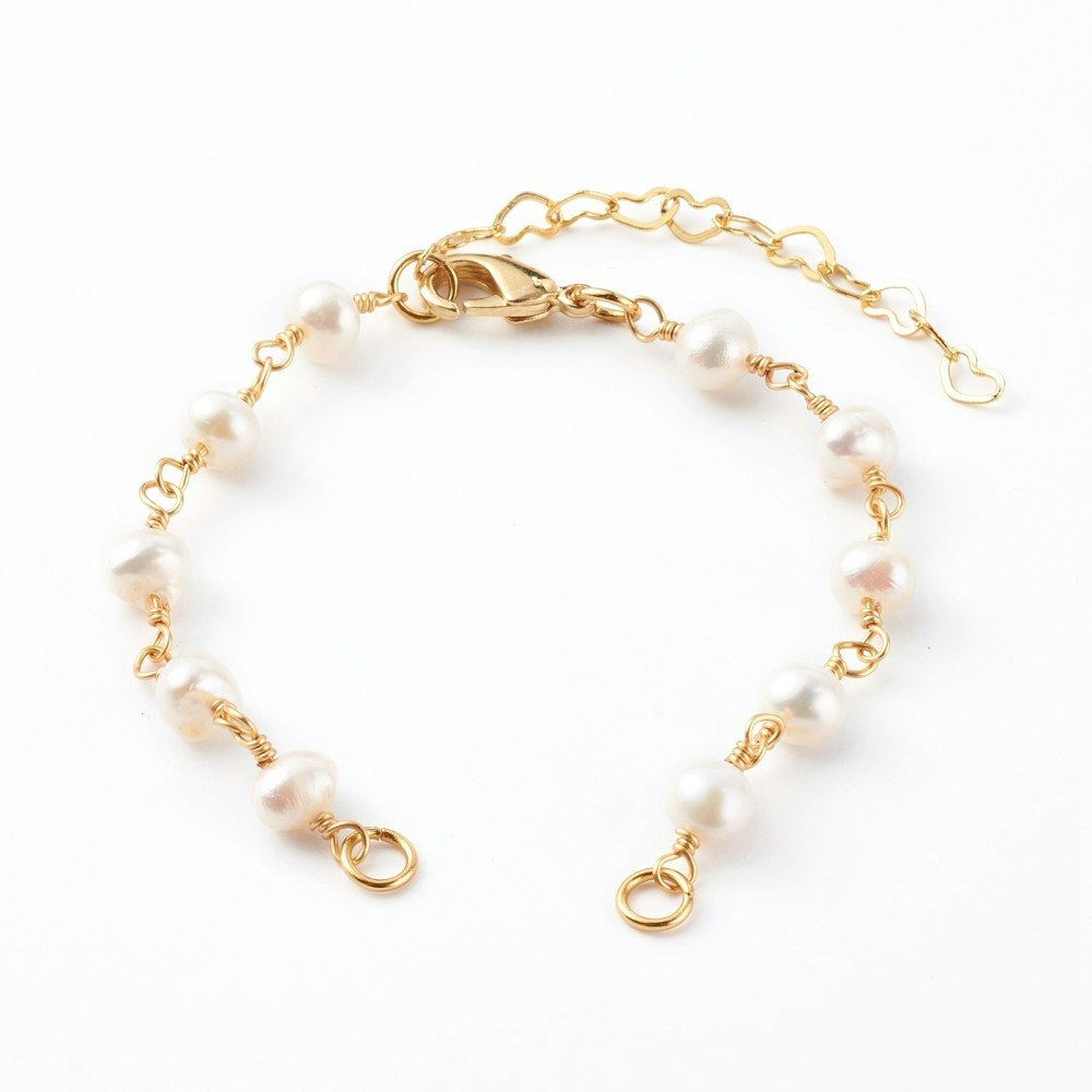 Guldfärgad armbandslänk med sötvattenspärlor, 1 st