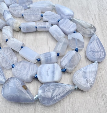 Blue lace agate liten flat sten