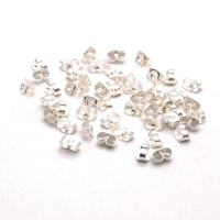 Silverfärgat rostfritt stål små ear nuts, ca 450-500 st