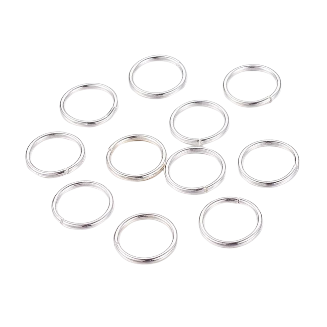 Silverfärgat rostfritt stål bindringar 5 mm, ca 100 st