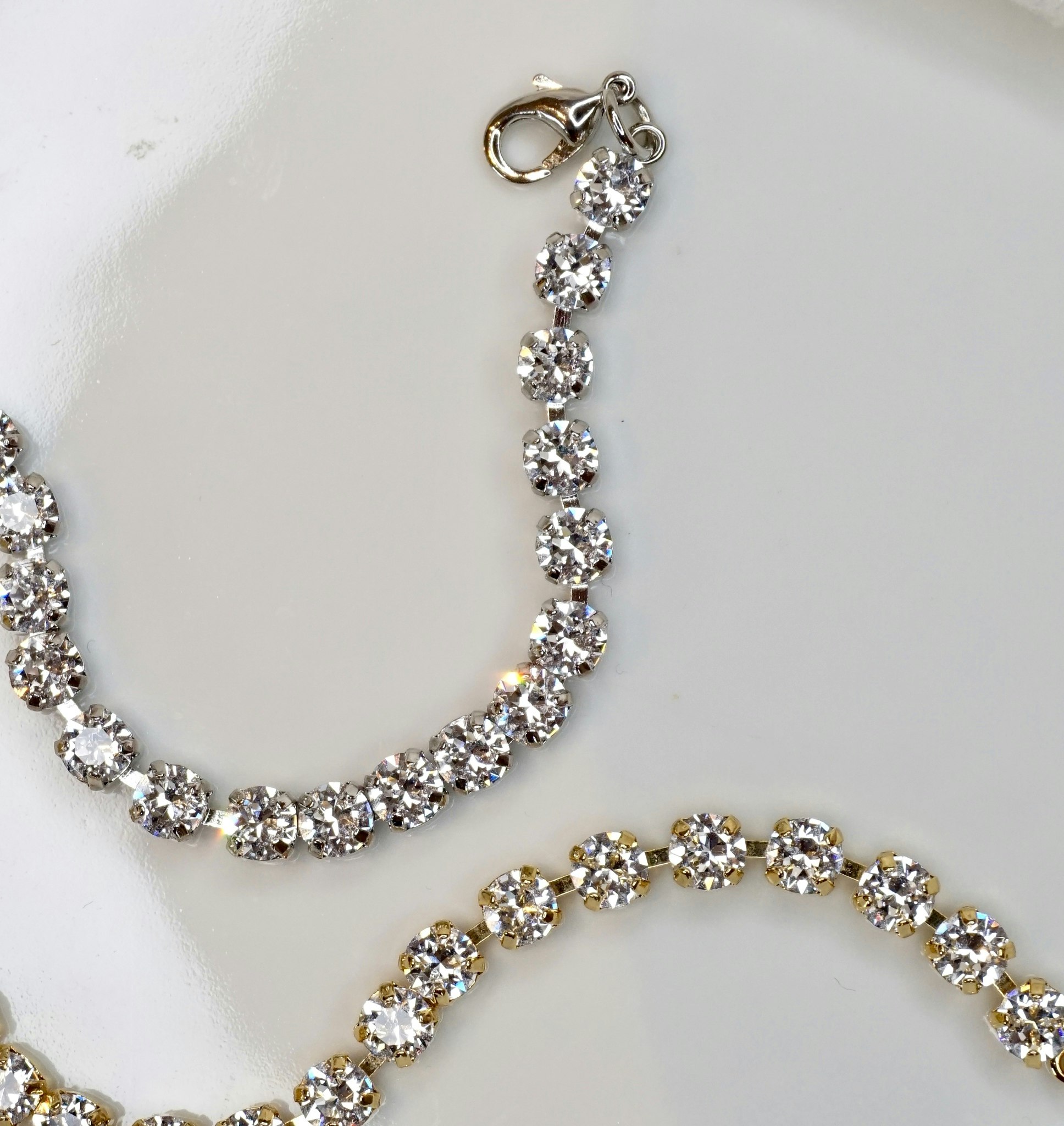 Zerlina armbånd i gull, rosegull eller rhodium