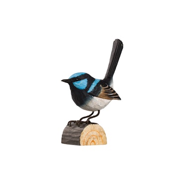 Hand-carved White-bellied Bluefly in wood
