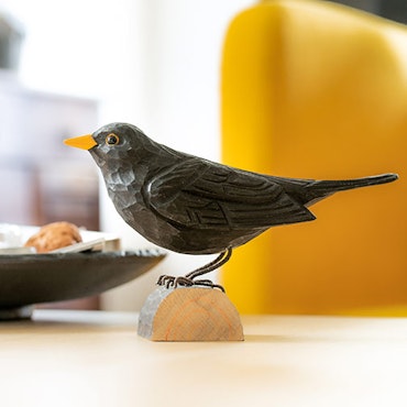 Hand-carved Blackbird in wood