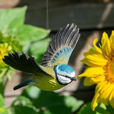Hand carved Flying Blue Tit in wood