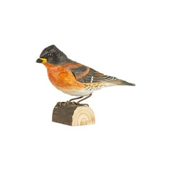 Hand-carved finch in wood