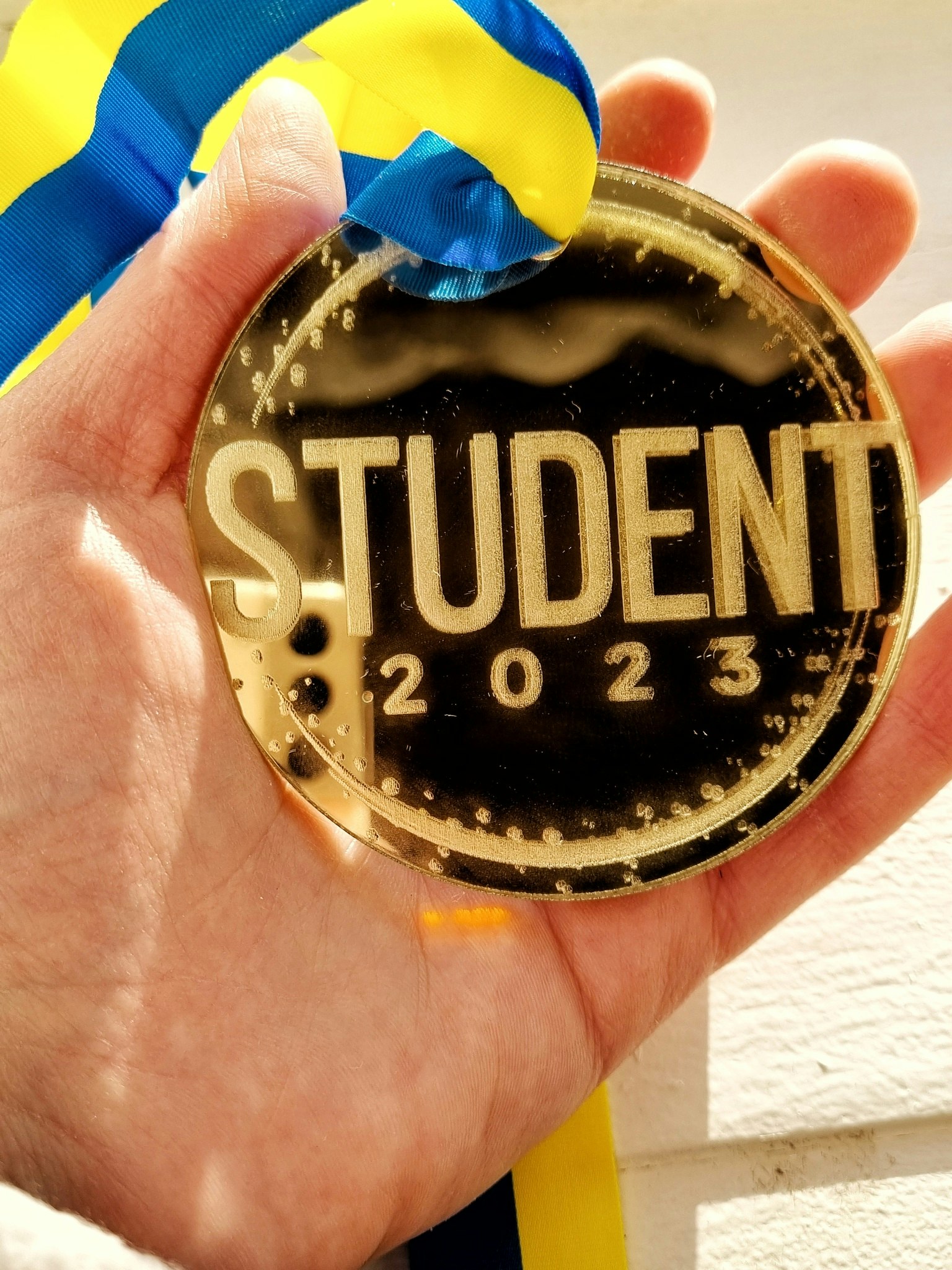 Medalj: STUDENT, rak