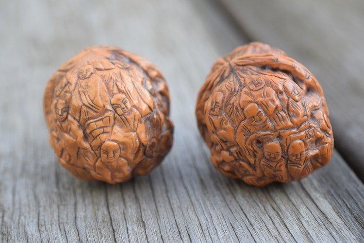 A pair of antique Chinese Handcarved Walnut shell Nutshell Hediao 18 Luohan
