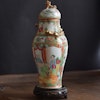 An antique canton rose lidded vase with gold gilded dragon decoration