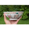 A large antique chinese bowl decorated with peach & bats Late Qing Dynasty