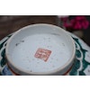 A large antique chinese bowl decorated with peach & bats Late Qing Dynasty