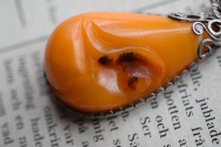 Antique natural baltic amber pendant egg yolk handcarved floral design 1960's