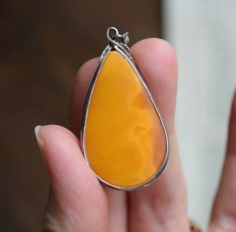 Antique natural baltic amber pendant egg yolk handcarved floral design 1960's