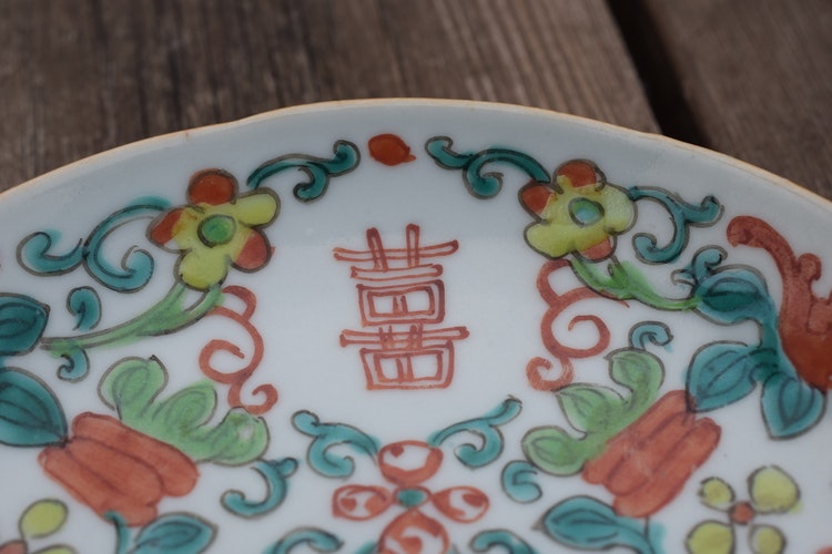 Antique chinese famille rose plate decorated with happiness characters and bats