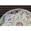 Antique chinese famille rose plate decorated with flowers, peach and bat