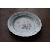 A antique Chinese famille rose plate in rococo shape, period of Qianlong