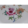 A antique Chinese famille rose plate in rococo shape, period of Qianlong