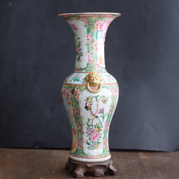 An antique canton rose mandarin vase with gold gilded lion handles