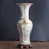 An antique canton rose mandarin vase with gold gilded lion handles