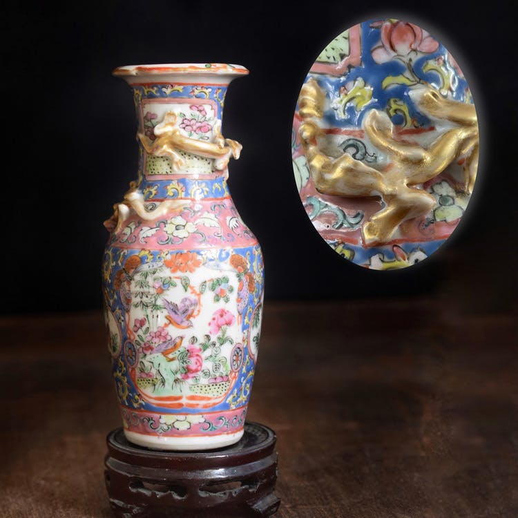 An antique canton famille rose vase with gold gilded dragons