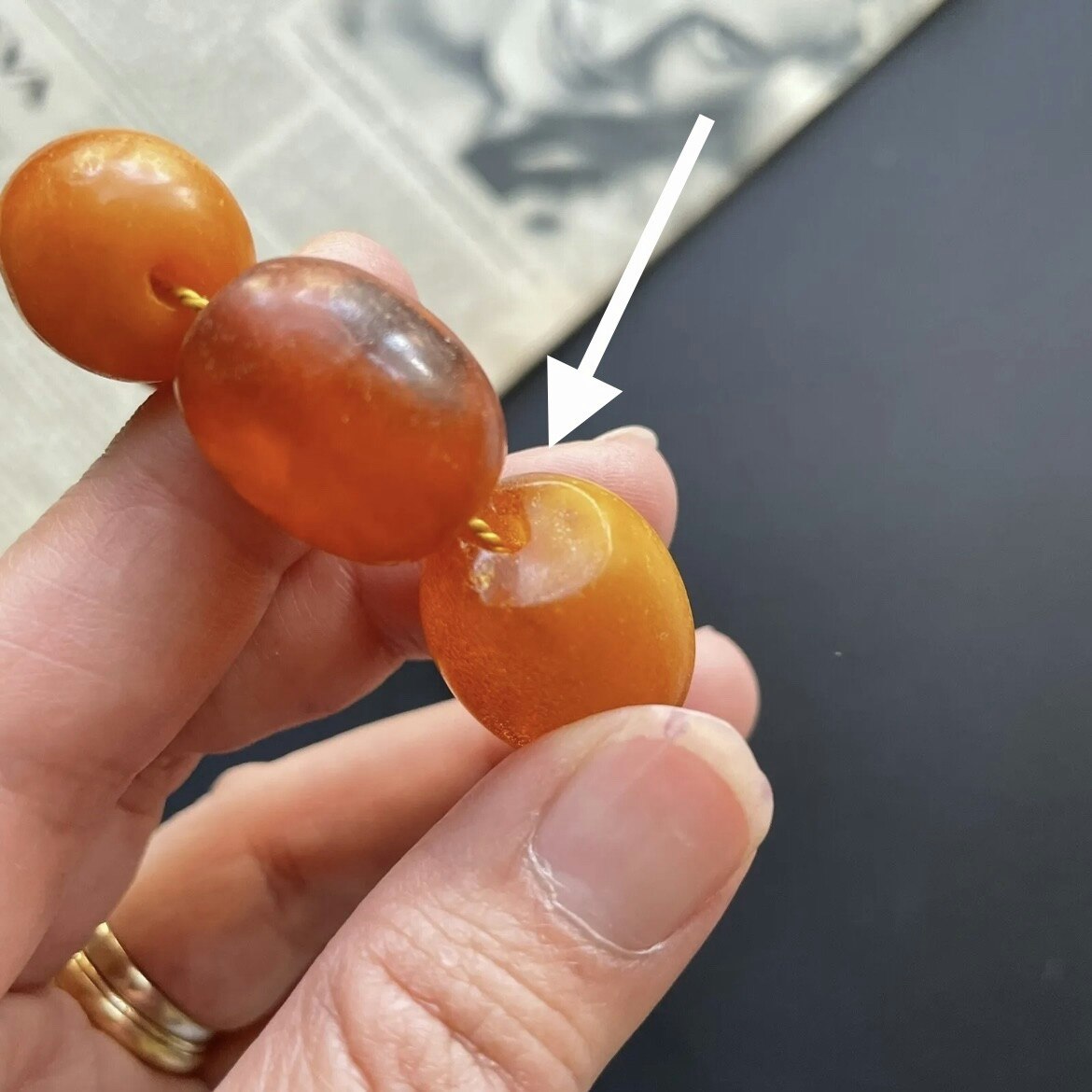 Two strings of butterscotch amber beads, one of graduated form, the largest  bead 2.5cm wide,