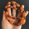 ANTIQUE NATURAL AMBER OVAL AND ROUND BEAD NECKLACE 43g #1858