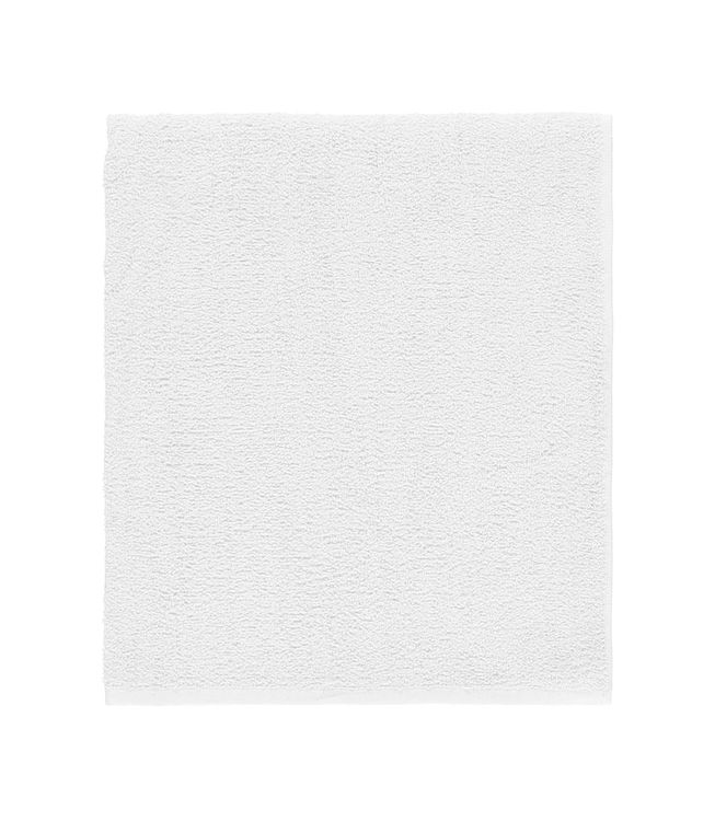 Selma ett vitt frottébadlakan i 100% bomull från Noble house, mått 70 x 130 cm.