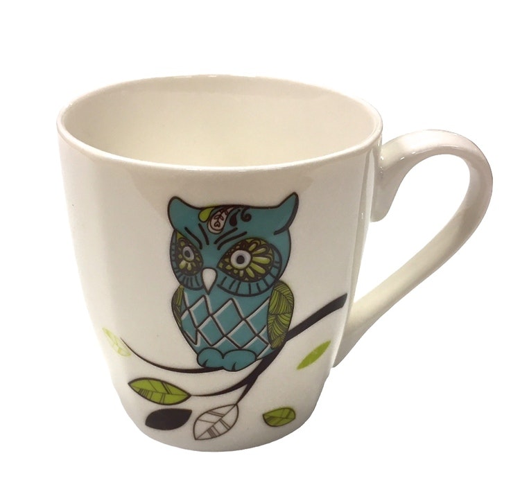 Owl 1 en kaffe/temugg i New bone China. Färg: Vit med ett uggletryck.