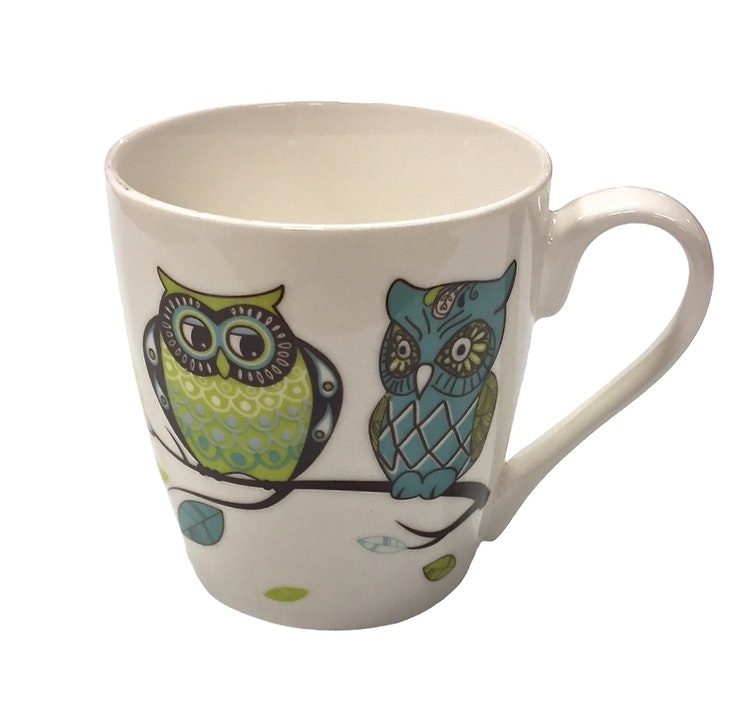 Owl 2 en kaffe/temugg i New bone China. Färg: Vit med ett uggletryck.