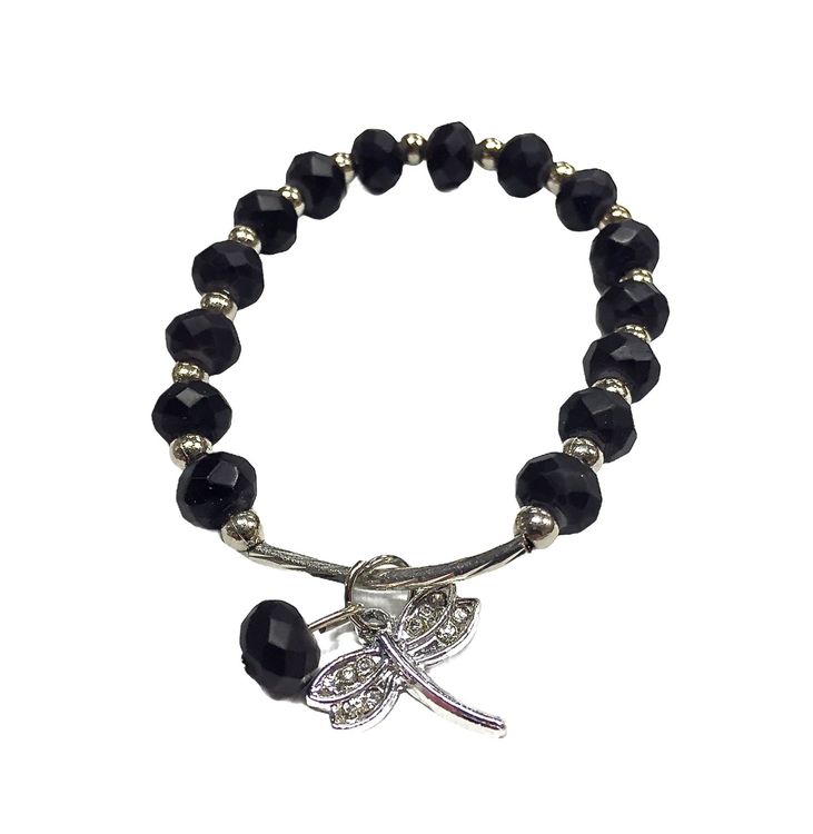 Armband med pärlor i polystone och en metallberlock med en slända. Art.nr: H 02006. Färg: Svart.
