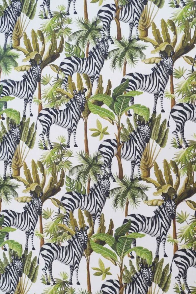 Zebra ett gardintyg/inredningstyg på metervara från Redlunds textil. Färg: Vit botten med ett zebratryck och palmer.