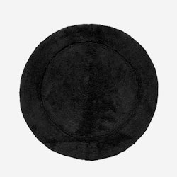 Chester en svart rund badrumsmatta i 100% bomull från Gripsholm med en diameter på 70 cm.