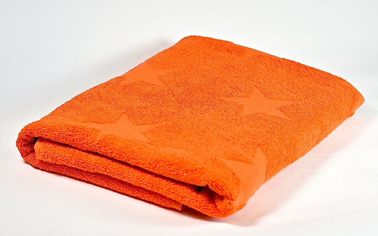 Nova star ett orange badlakan i 100% bomull från Noble house, mått 70 x 130  cm. - Roomoutlet.se - Textilier och inredning i Karlstad