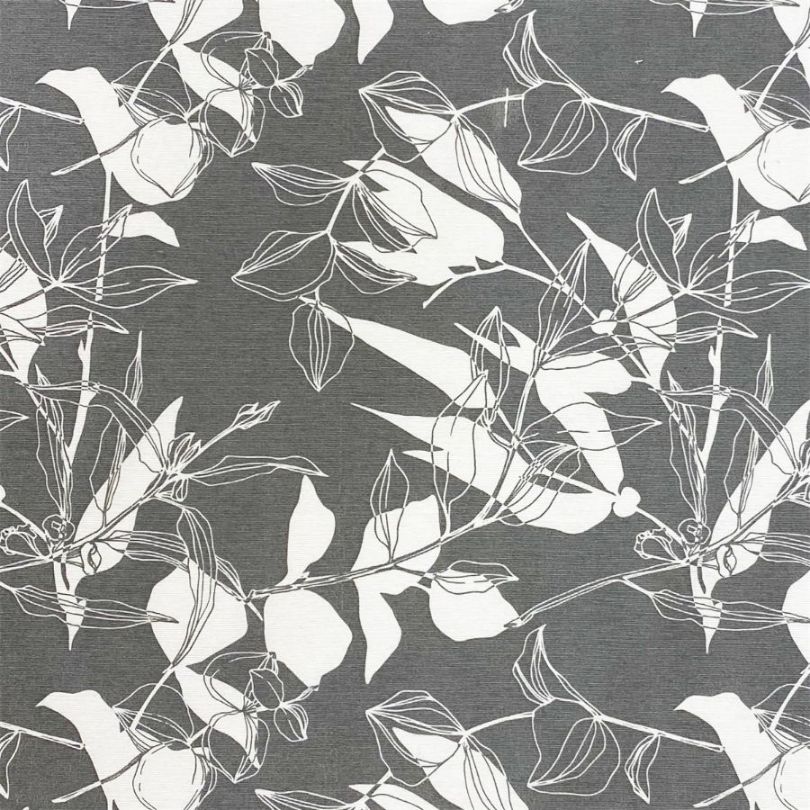 Zen ett gardintyg/inredningstyg på metervara med ett grått och vitt bladmönster från Redlunds textil.
