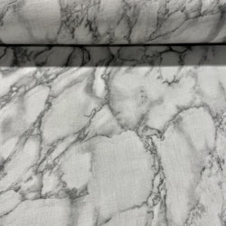 Marmor ett tunt vitt linnetyg med ett marmormönster i bredd 140 cm