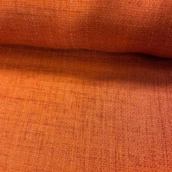 Berit en orange enfärgad metervara med en lite grövre vävning
