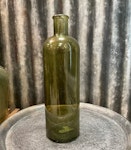 Glasflaska, grön glasflaska, flaska med ljushållare, tidlös inredning, inredningsdetalj
