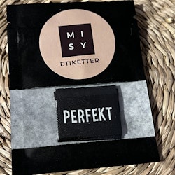 Perfekt- svart m hvitt label