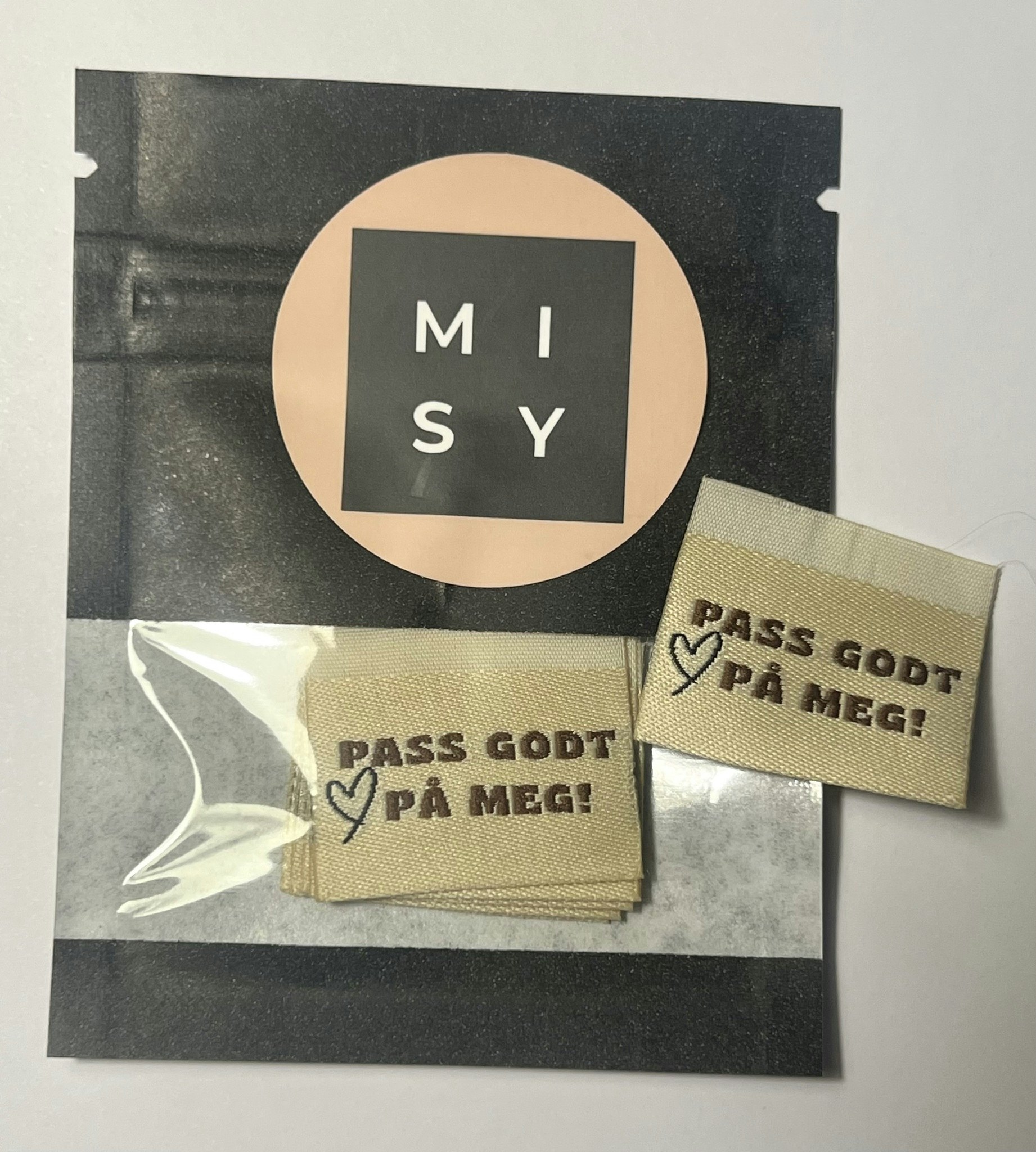 Pass godt på meg beige