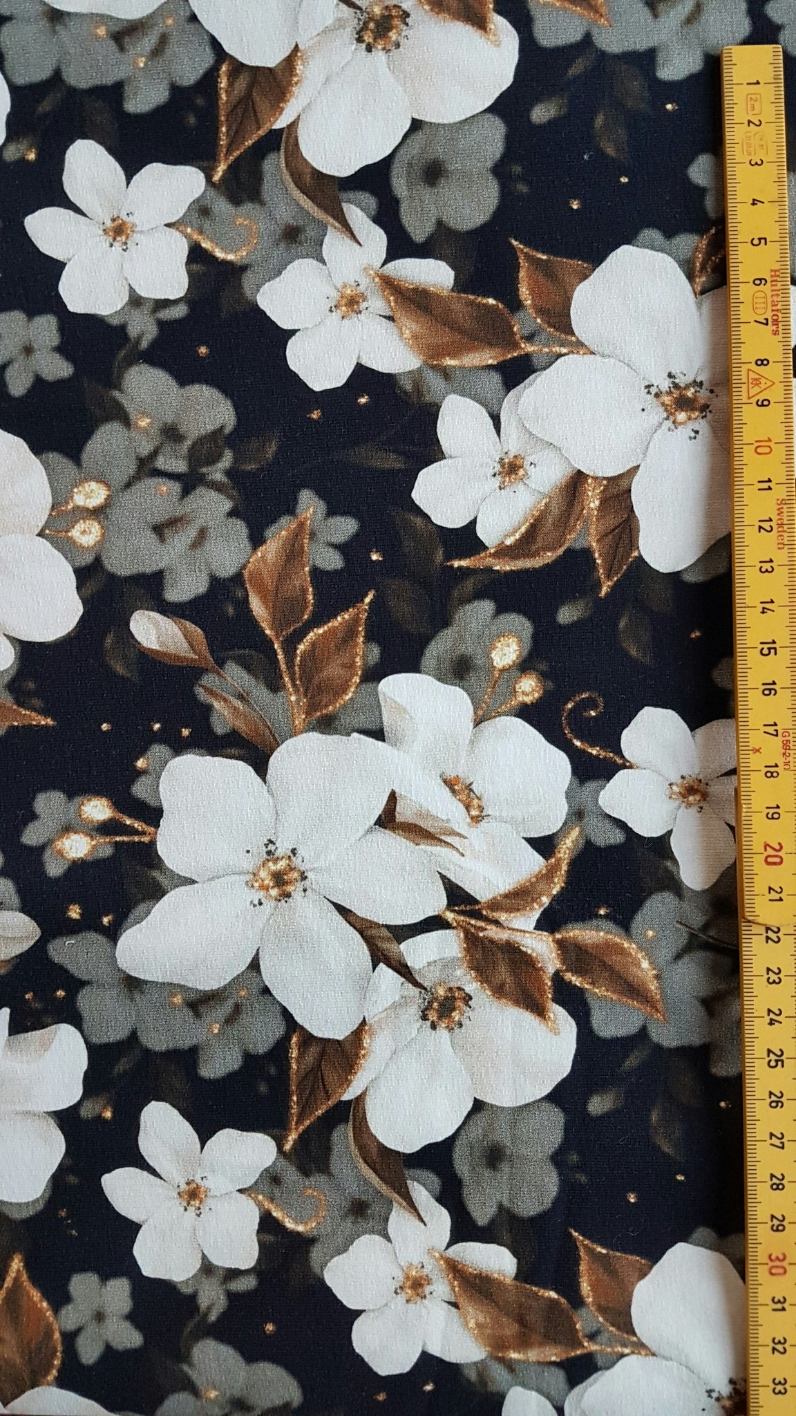 Vita Blommor Svart Guld College