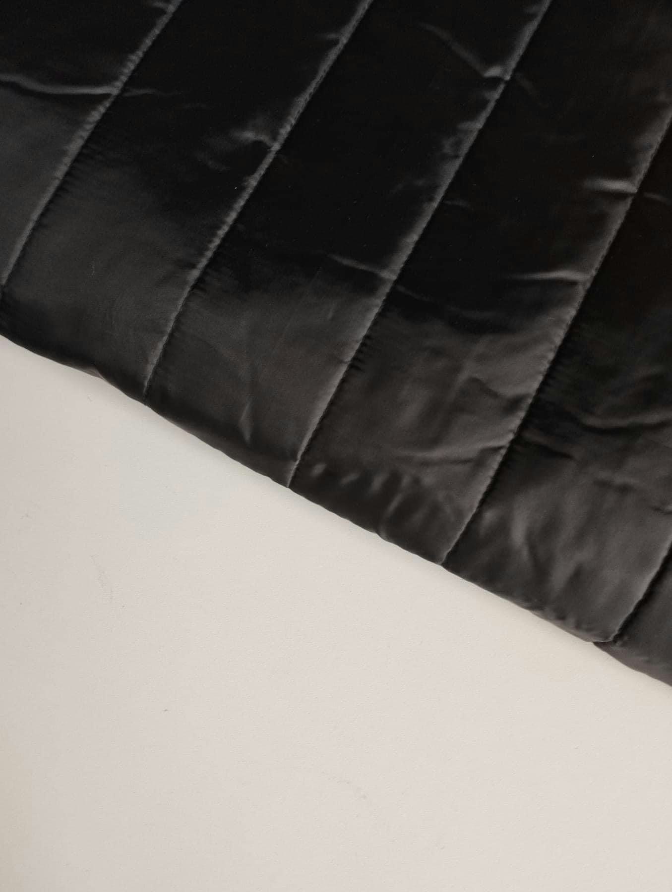 Quilt med foder Svart