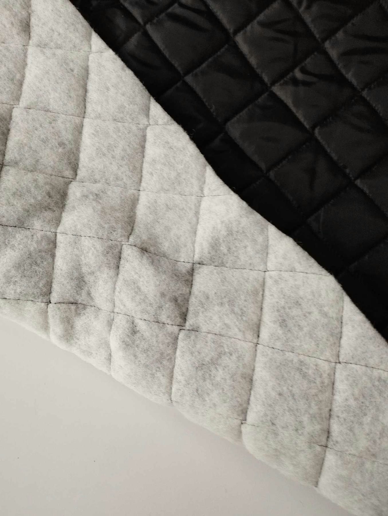 Quilt med foder Svart