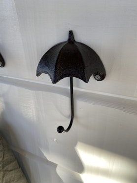 Gjuten krok i form av paraply
